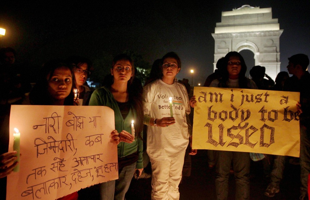 Volunteers of Better India participating in a candle light protest at India Gate in New Delhi on Tuesday condemning the gang rape of a 23-year-old student on a city bus. PTI photo
